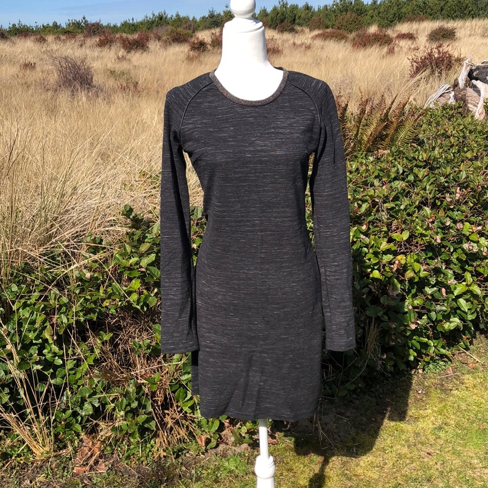 Long sleeve black mini dress with beaded collar
